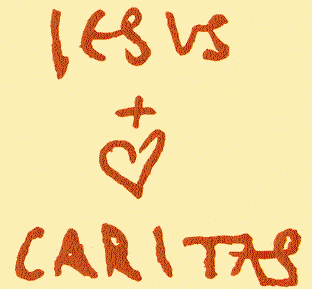 de handtekening van Charles de Foucauld: Jesus Caritas, met een hart.