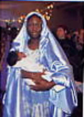 moeder met baby. Images du Mois